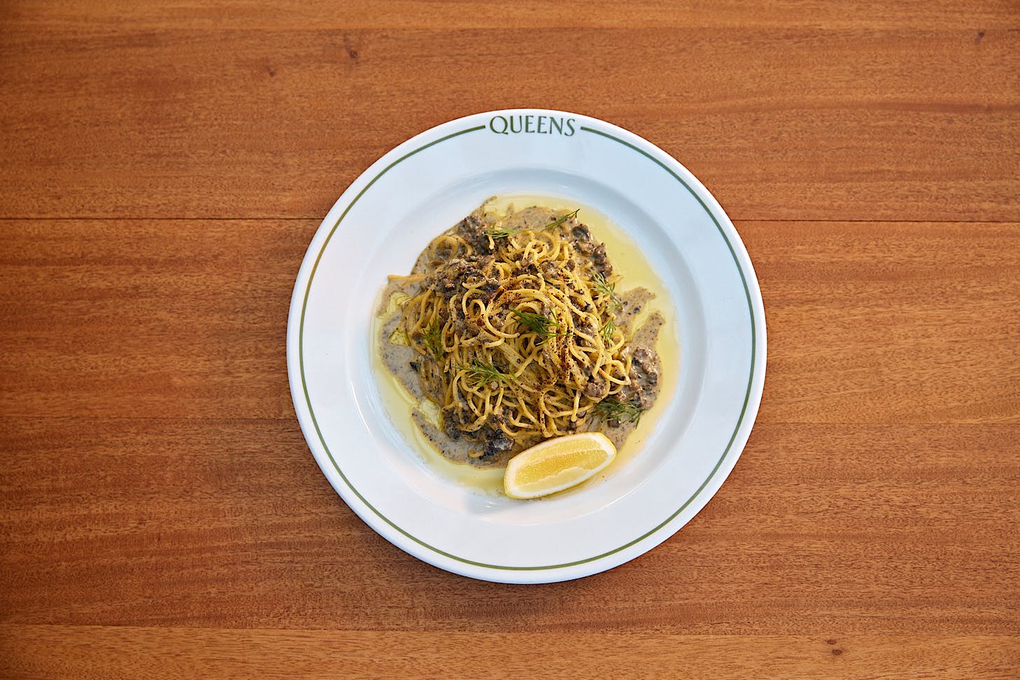 A Queens Matariki Special Pasta: hand-rolled saffron fettuccine with South Island creamed pāua and shaved black truffle.